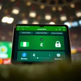 Illustration displaying the Campobet e-wallet interface with Nigerian currency symbols and secure transaction icons